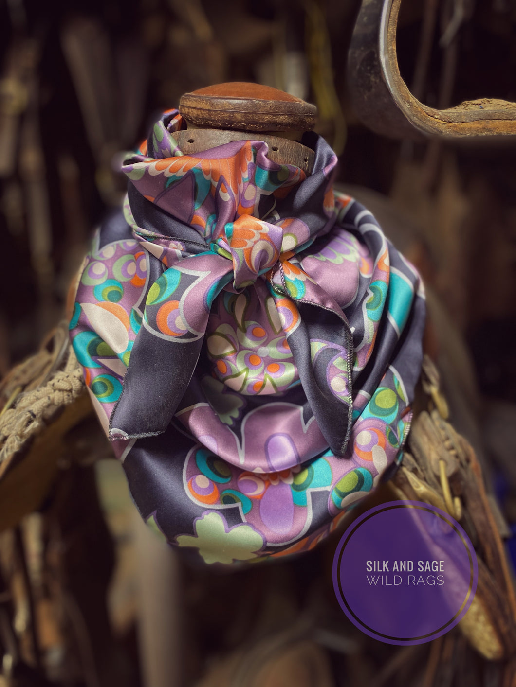 Gorgeous, deep plum, orange, white, green and teal floral is made of Super soft 100% silk.