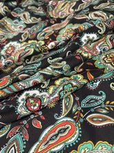 Load image into Gallery viewer, Bold colors of turquoise, red, blue, green orange, mustard yellow. Paisley floral print on a soft peach skin.
