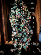 Load image into Gallery viewer, Bold colors of turquoise, red, blue, green orange, mustard yellow. Paisley floral print on a soft peach skin.
