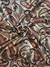 Load image into Gallery viewer, Creamy cream paisley with navy, greens, orange and a touch of gold.  Silky charmeuse print.
