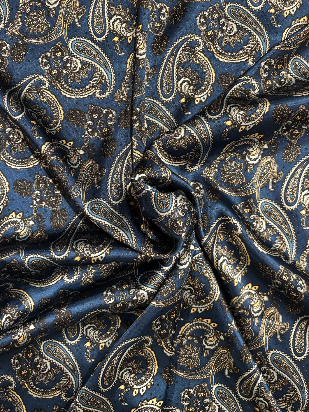 Bold blues, black and cream paisley on a Silky charmeuse fabric