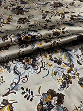 Load image into Gallery viewer, Light blue, gray back ground with stunning brown, gold and blue floral print on a Silky charmeuse fabric
