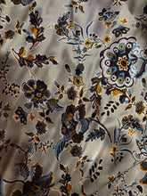 Load image into Gallery viewer, Light blue, gray back ground with stunning brown, gold and blue floral print on a Silky charmeuse fabric
