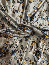 Load image into Gallery viewer, Light blue, gray back ground with stunning brown, gold and blue floral print on a Silky charmeuse fabric
