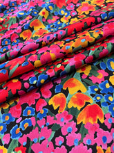 Load image into Gallery viewer, Stunning colorful, vibrant versatile wild rag, made of soft peach skin fabric.
