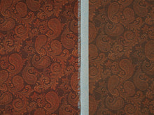 Load image into Gallery viewer, Rich brown elegant paisley pattern with warm copper tones on a silky charmeuse fabric.
