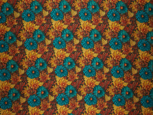 Load image into Gallery viewer, Tooled floral. Rich gold, bronze, teal and brown double sided floral pattern on a silky charmeuse fabric.
