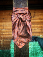 Load image into Gallery viewer, Rich brown elegant paisley pattern with warm copper tones on a silky charmeuse fabric.

