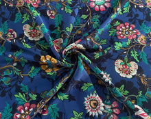 Load image into Gallery viewer, Vibrant colorful dark blue, teal, green, red, mustard and brown floral print on a silky super soft peach skin fabric.
