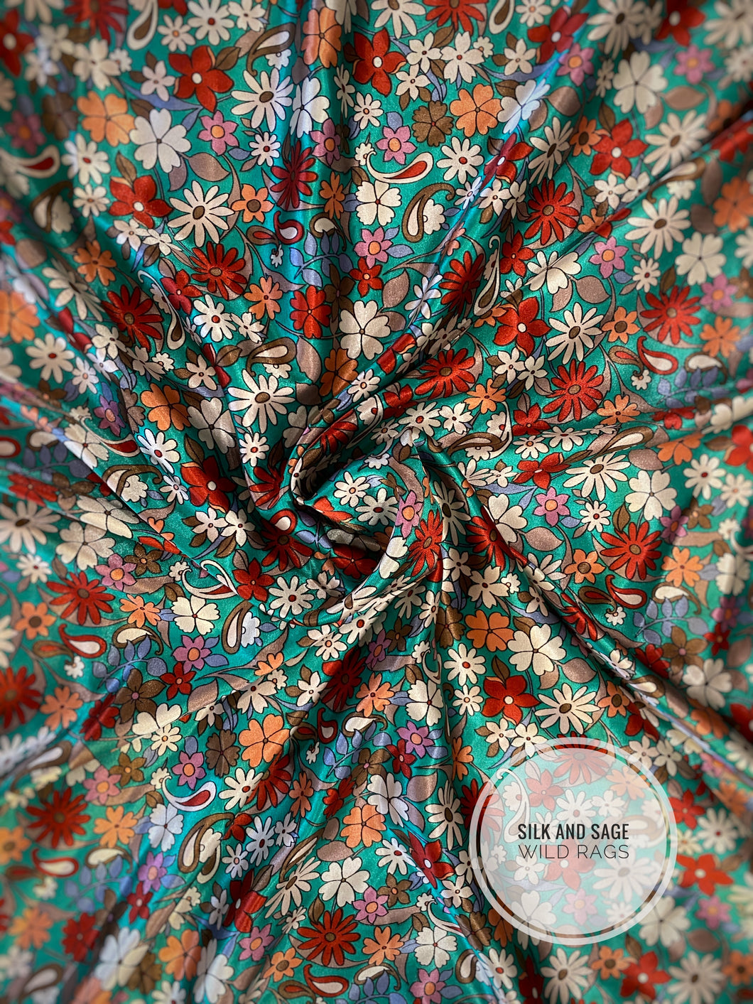 Super fun, floral and paisley charmeuse in teal, turquoise, pink, olive, blue, cream and rust colors