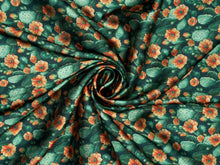 Load image into Gallery viewer, Double sided wild rag. Rich cactus floral print with deep desert greens and warm sunset orange blooms.
