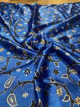 Load image into Gallery viewer, Boot top stitch, brilliant blue and white  floral and paisley print on a silky charmeuse fabric.
