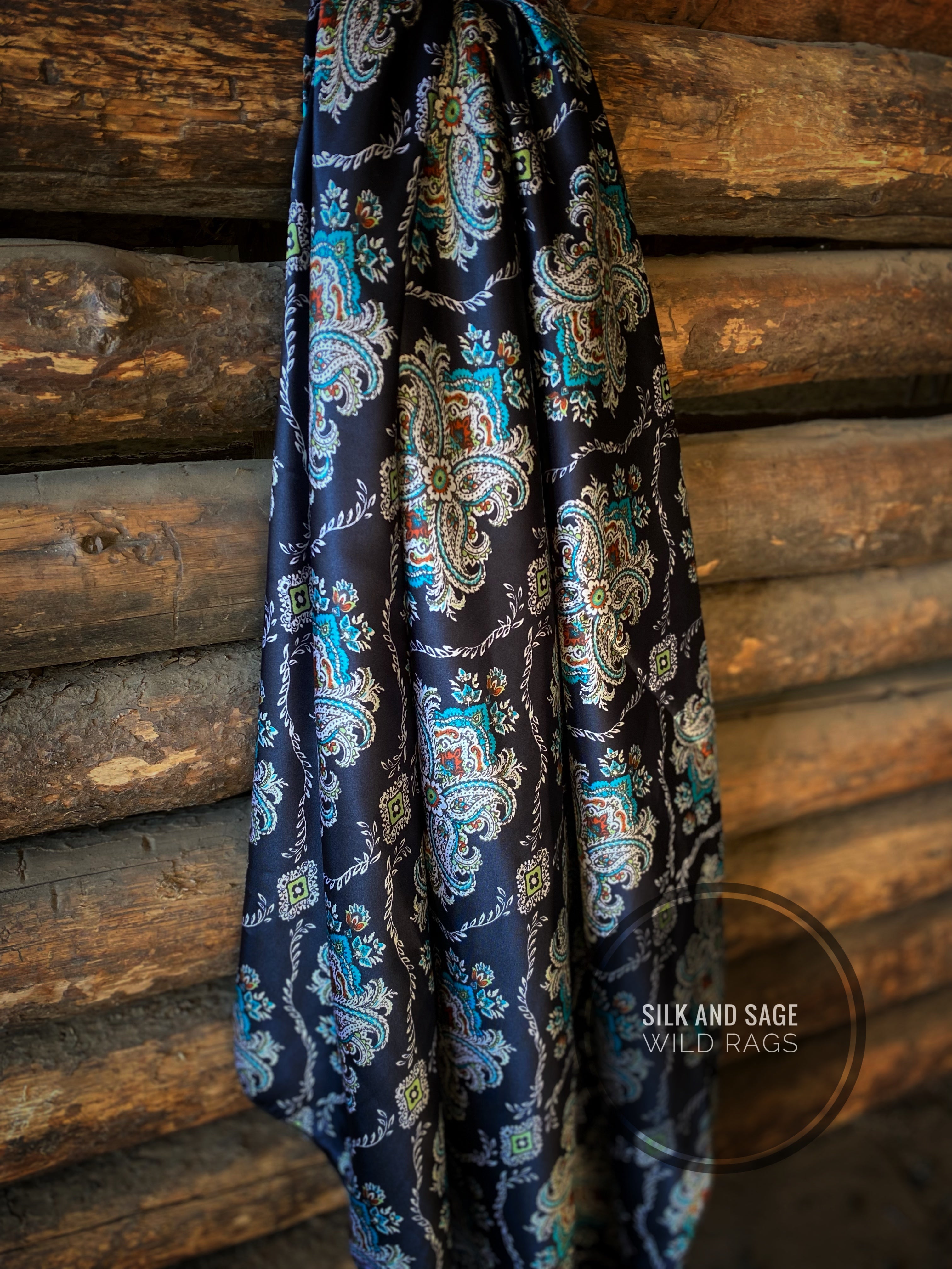 Deep black, teal, ivory, rust and green damask floral and paisley prin ...