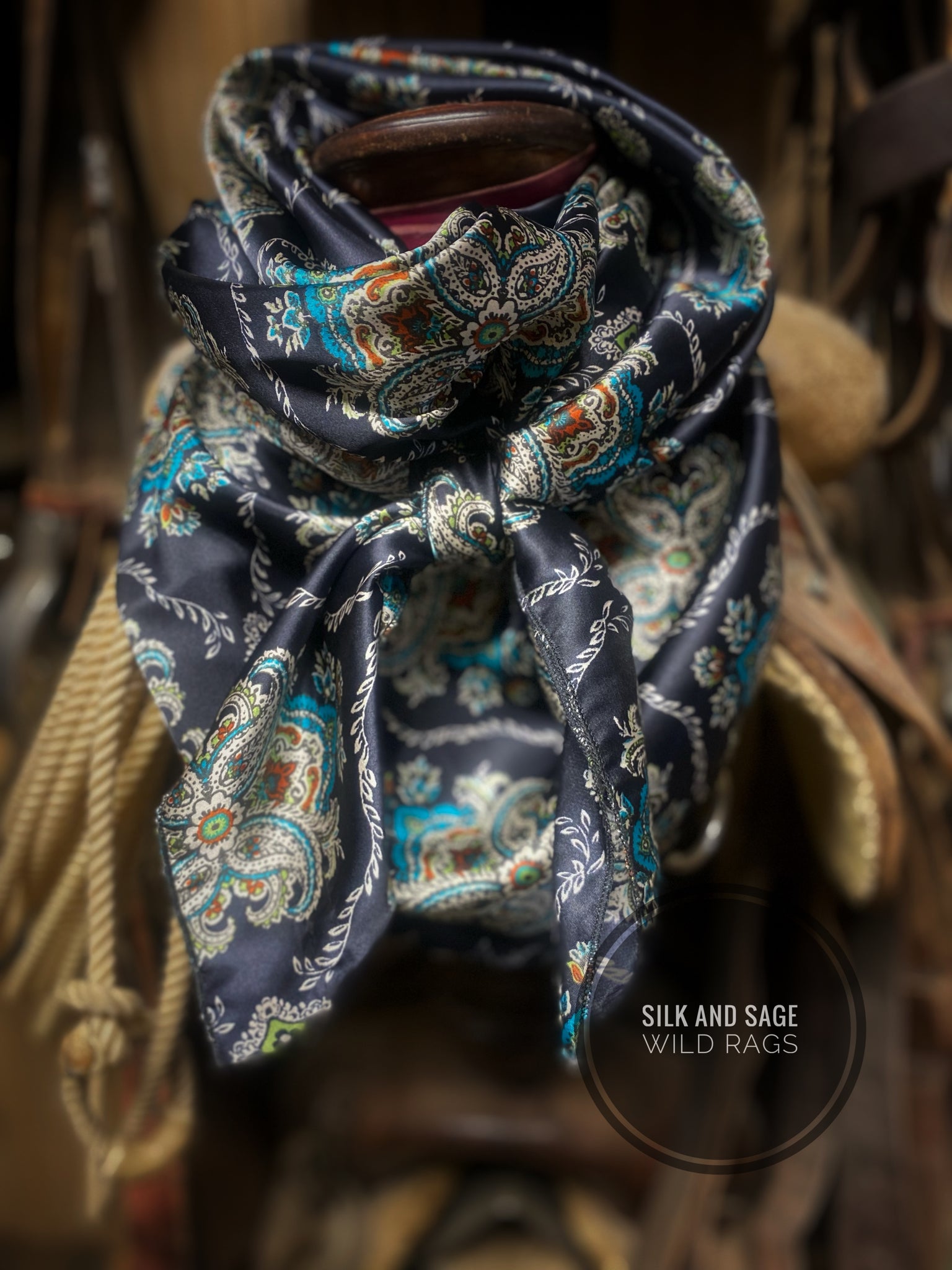 Deep black, teal, ivory, rust and green damask floral and paisley prin ...