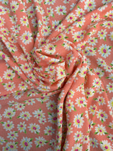 Load image into Gallery viewer, Super cute peach, pink, yellow, green and white daisy print on a soft peach skin.
