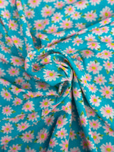 Load image into Gallery viewer, Super cute blue, pink, green and white daisy print on a soft peach skin fabric.
