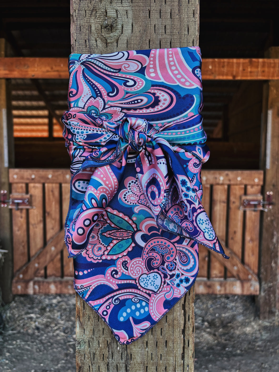 Blue, pink and turquoise paisley floral on a silky charmeuse poly blend