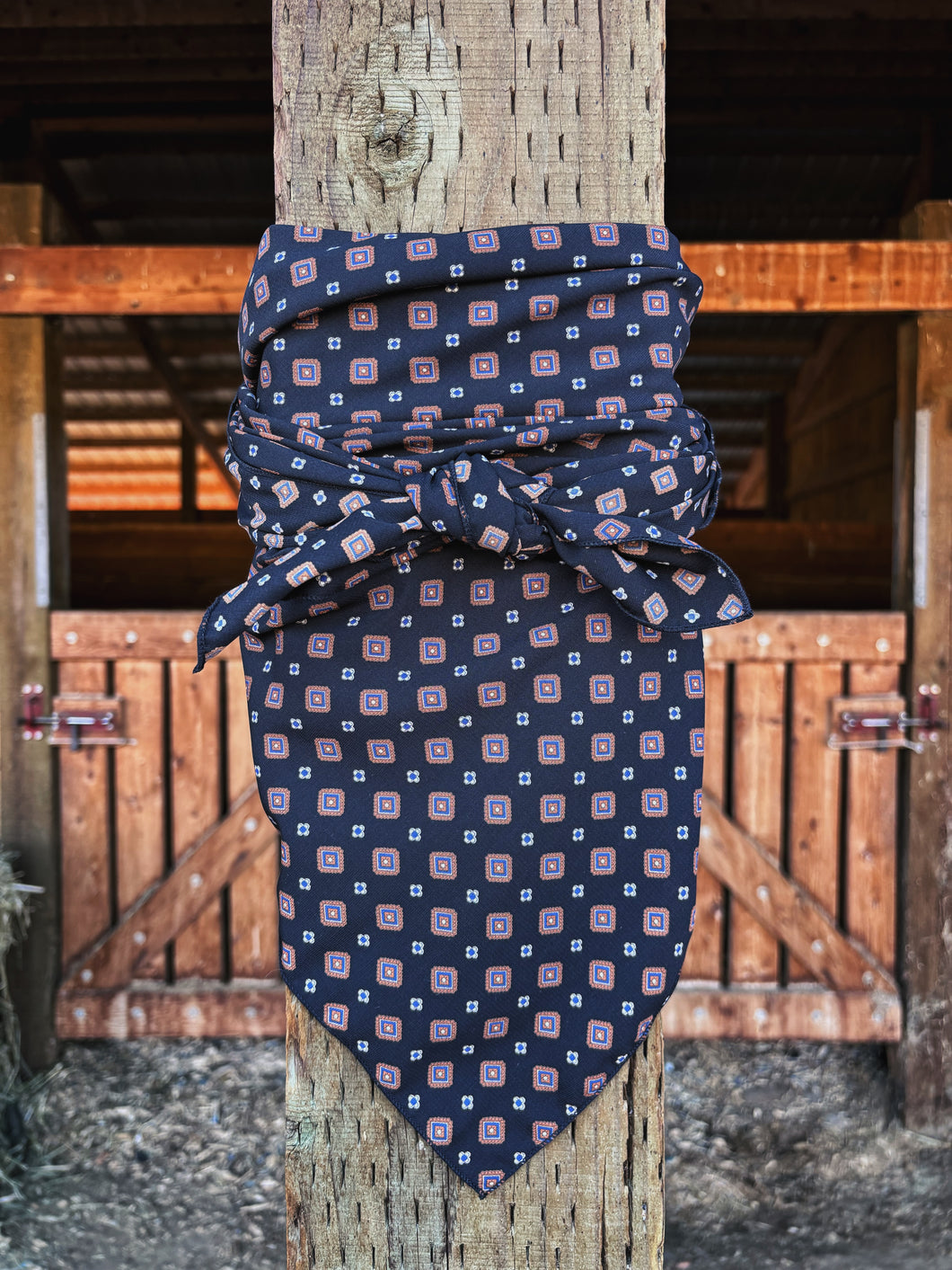 Black red, blue and white retro squares with black background on a soft peach skin fabric