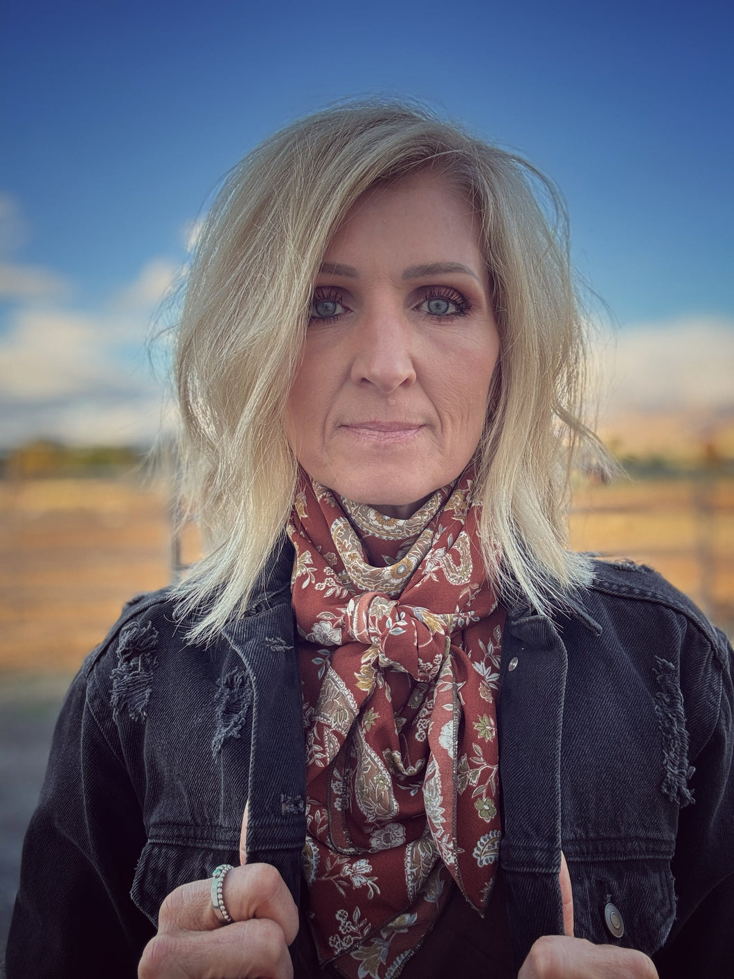 Stunning rust and cream paisley and floral print on a soft peach skin fabric