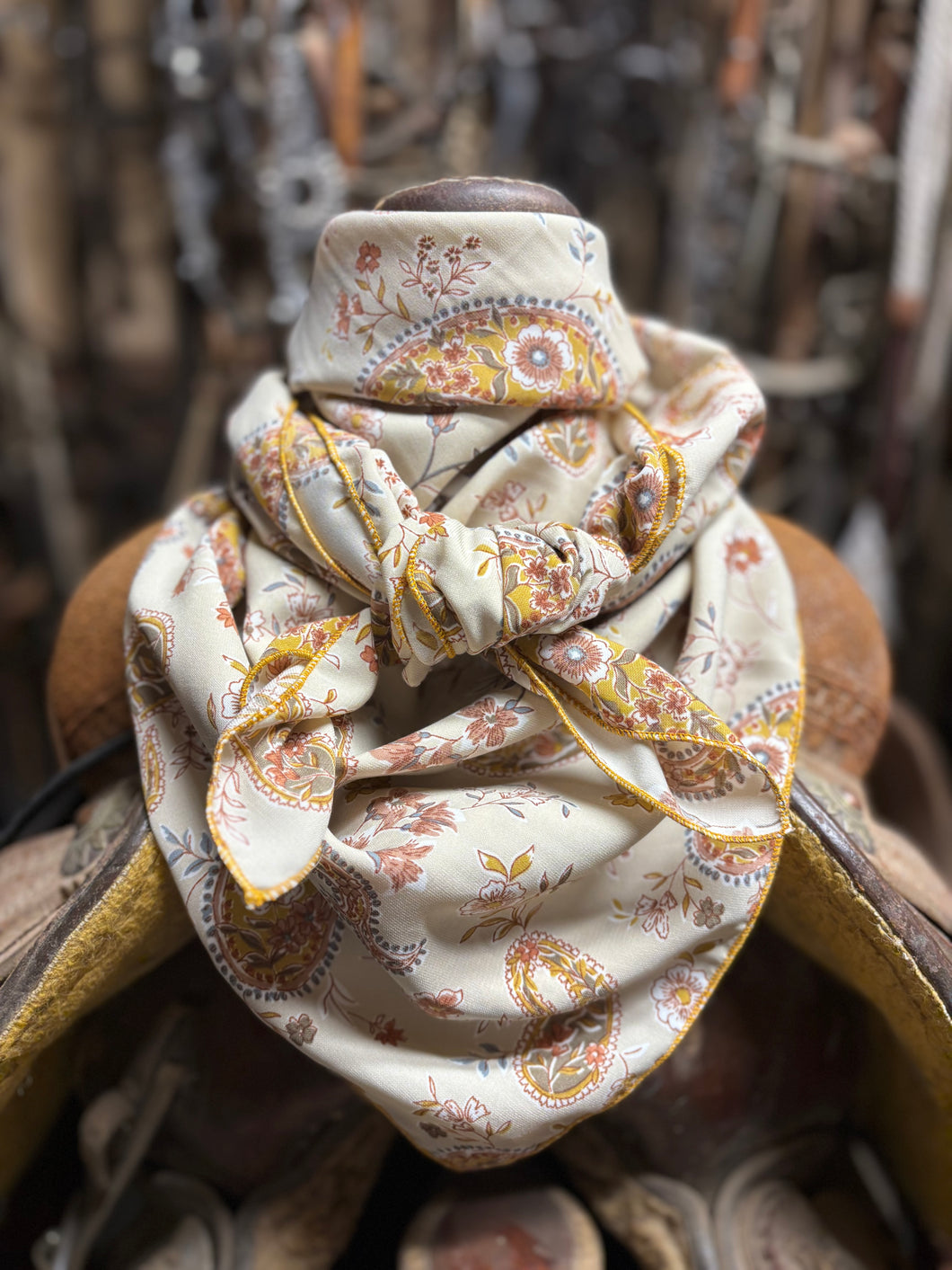 Stunning cream, buttery golden mustard yellow with hints of sage green, paisley and floral print on a soft peach skin fabr