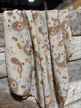Load image into Gallery viewer, Stunning cream, buttery golden mustard yellow with hints of sage green, paisley and floral print on a soft peach skin fabr
