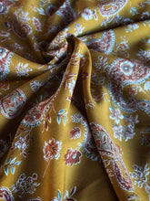 Load image into Gallery viewer, Stunning mustard, rust paisley and floral print on a soft peach skin fabric
