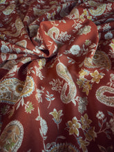 Load image into Gallery viewer, Stunning rust and cream paisley and floral print on a soft peach skin fabric
