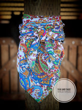 Load image into Gallery viewer, Colorful paisley floral on a soft peach skin fabric.
