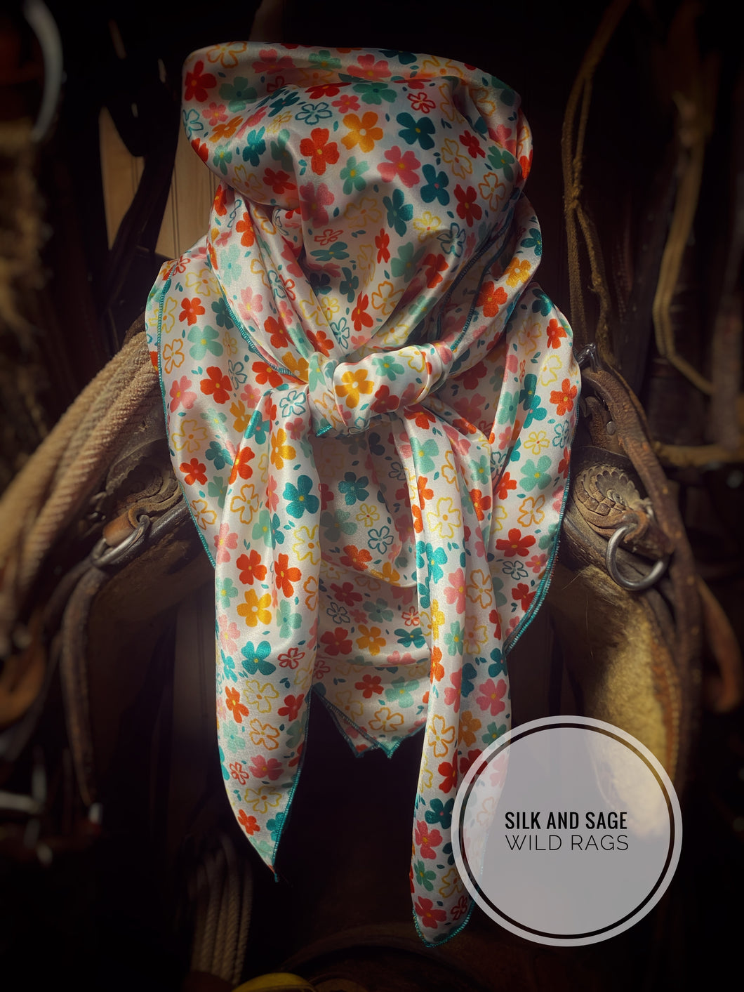 Super fun pink, red, teal, turquoise, mustard, orange floral with a white back ground. Super silky charmeuse fabric