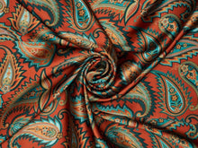 Load image into Gallery viewer, Stunning jagged paisley and floral print. Vibrant orange, sky blue, teal, turquoise and tan silky charmeuse.
