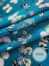 Load image into Gallery viewer, Butterflies butterflies butterflies!!! Super fun Blue, green, turquoise, white  cdc fabric.
