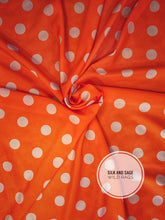 Load image into Gallery viewer, Bright, vibrant orange and off white, soft, silky peach skin.
