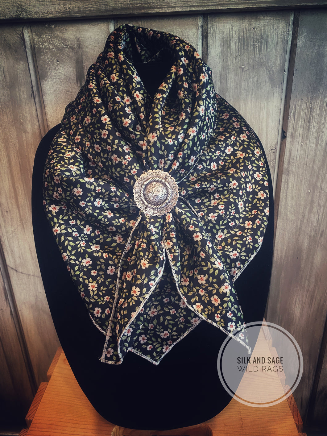 Retro, vintage, dainty floral print.  Black with white, olive green and coal tones on a silky soft peach skin fabric.